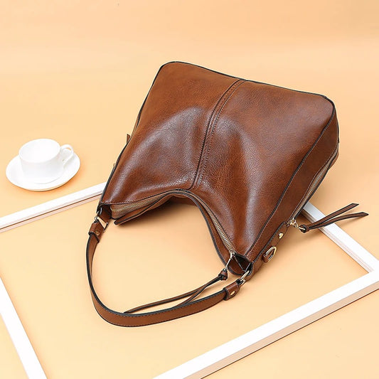 Veloretta | Elegante Ledertasche mit großem Inhalt und Seitentaschen